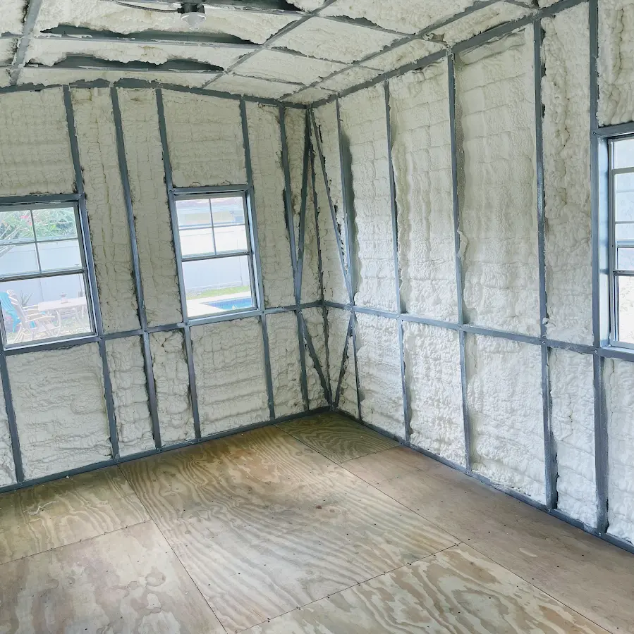 Closed-cell spray foam insulation applied to wall cavities in a residential project in Downers Grove